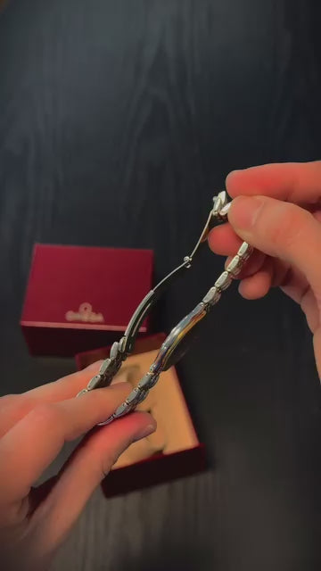 Omega de Ville Symbol